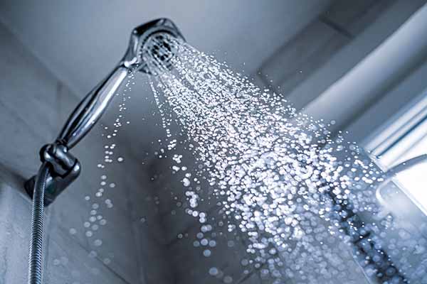 Plumber Cleveleys - Cleaning and unblocking drain - running shower