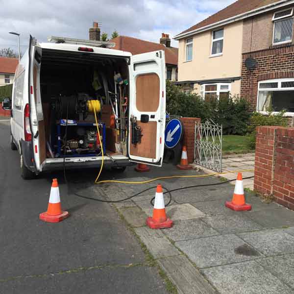 Drain unblocking Thornton Cleveleys - Cleaning and unblocking drain - sinks n sewers van with hose